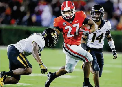  ?? CURTIS COMPTON / CCOMPTON@AJC.COM ?? Nick Chubb knows the shelf life for an NFL running back usually is not long but says he does not feel overused while leading the SEC with 765 yards. “I feel great,” Chubb said. “I feel better now than I did at the beginning of the season.”