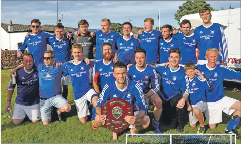  ?? 01_B36footy01 ?? Brodick are crowned four-in-a-row league champions.