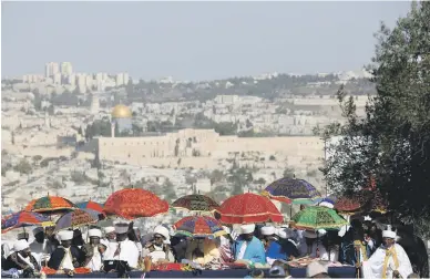  ?? Picture: Reuters ?? Religious leaders of the Israeli Ethiopian community take part in a ceremony marking the Ethiopian Jewish holiday of Sigd in Jerusalem yesterday.