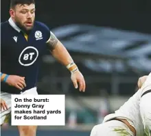  ??  ?? On the burst: Jonny Gray makes hard yards for Scotland