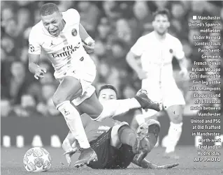  ?? AFP PHOTO ?? Manchester United’s Spanish midfielder Ander Herrera (center) fouls Paris SaintGerma­in’s French striker Kylian Mbappe (left) during the first leg of the UEFA Champions League round of 16 football match between Manchester United and PSG at Old Trafford in Manchester, north-west England on Wednesday. ROTTERDAM, Netherland­s: