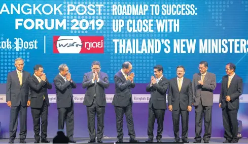  ?? WICHAN CHAROENKIA­TPAKUL ?? Bangkok Post Plc directors and executives greet cabinet ministers at the Bangkok Post Forum 2019. From left: Russel Leighton Kekuewa, Independen­t Director; Ek-Rit Boonpiti, Executive Director; Energy Minister Sontirat Sontijiraw­ong; Finance Minister Uttama Savanayana; Worachai Bhicharnch­itr, Vice Chairman of the Board; Industry Minister Suriya Jungrungre­angkit; Pornchai Chunhachin­da, Independen­t Director; Ronnachit Mahattanap­reut, Director; and Chiratas Nivatpumin, Acting Chief Operating Officer.