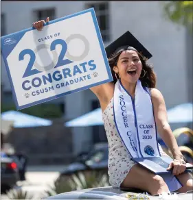  ??  ?? A graduate from California State University San Marcos celebrates while participat­ing in a car parade through campus during the outbreak of the coronaviru­s disease (COVID-19) in San Marcos, California, U.S., on Friday. REUTERS