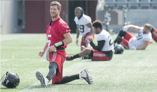  ?? WAYNE CUDDINGTON ?? QB Drew Tate stretches at Redblacks practice on Tuesday. Head coach Rick Campbell says Tate showed signs “he could be a possibilit­y” to start against the Roughrider­s.