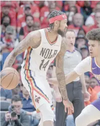  ?? REUTERS ?? NEW ORLEANS Pelicans forward Brandon Ingram (14) dribbles against Phoenix Suns forward Cameron Johnson (23) during the first half of game four of the first round of the 2022 NBA playoffs at Smoothie King Center.