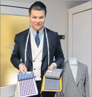  ?? TERRENCE MCEACHERN/THE GUARDIAN ?? Alexander Peters of Raffiné Custom Clothiers is the only bespoke suit retailer on the Island. He has more than 1,000 different fabrics to choose from when making a suit.