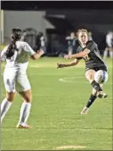  ?? Tim Godbee ?? Calhoun senior defender Kenadi Morgan clears the ball against Woodland.