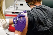  ?? AP 2020 ?? TheU. S. Food and Drug Administra­tion and a federal advisory committee are talking about the process of approving COVID- 19 vaccines, after political back- and- forth has raised public fear that the fifirst round of vaccines will not be reliable.