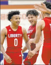  ?? Las Vegas Review-journal
@ellenschmi­dttt ?? Ellen Schmidt
Sophomore Tyus Thomas, left, will be the point guard for Liberty, which also returns starter Andre Porter (5) after losing in the state title game last season.