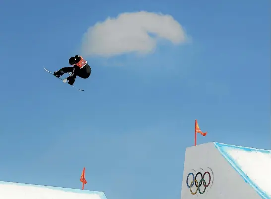  ?? PHOTOS: GETTY IMAGES ?? Carlos Garcia Knight competes during the final of the snowboardi­ng in PyeongChan­g yesterday. The New Zealander led after the first round but had to settle for fifth.