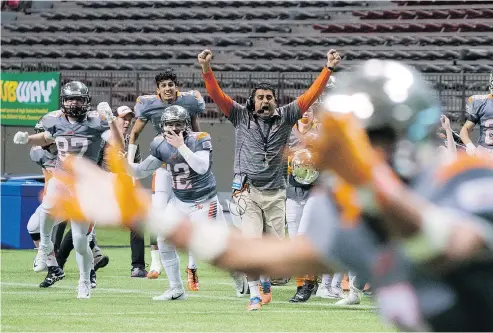  ?? RICHARD LAM/PNG FILES ?? The No. 5 New Westminste­r Hyacks, the reigning provincial triple-A football champions led by coach Farhan Lalji, will face a stiff test at home Friday when they host the No. 3 Vancouver College Fighting Irish.