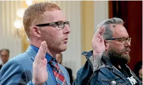  ?? AP ?? Stephen Ayres, who pleaded guilty in June 2022 to disorderly conduct in a restricted building, left, and Jason Van Tatenhove, an ally of Oath Keepers leader Stewart Rhodes, right, are sworn in to testify as the House select committee investigat­ing the January 6 attack on the US Capitol holds a hearing at the Capitol in Washington yesterday.