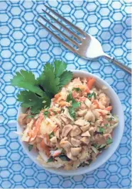  ?? ANNA THOMAS BATES ?? Cabbage brings crunch and nutrition to this late-winter Asian salad.