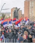  ?? AFP ?? Kosovo Serbs wave Serbian flags during a protest in the Serb predominan­t part of Mitrovica on Nov 6.