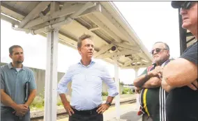  ?? Ned Gerard / Hearst Connecticu­t Media ?? Ned Lamont speaks to voters at the train station in Ansonia on Monday.