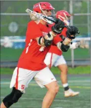  ?? DEBBY HIGH FOR DIGITAL FIRST MEDIA ?? Souderton’s Stephen Blue carries the ball Thursday night against North Penn.