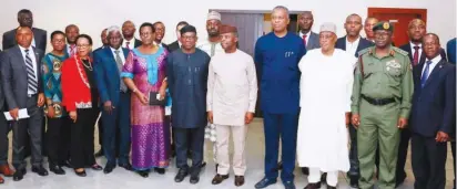  ?? Photo: Felix Onigbinde ?? Acting President Yemi Osinbajo SAN (5th right); Minister for Foreign Affairs, Mr. Geoffrey Onyeama(4th right); Minister of Defence, Brig Gen Mansur Dan Ali (3rd right); Chief of Defence Staff, General Olonisakin Abayomi (2nd right); Nigeria’s...