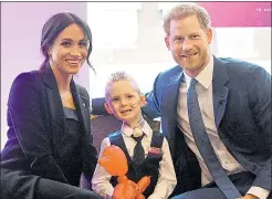  ??  ?? Harry and Meghan meet award winner McKenzie Brackley, four