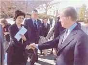 ?? COURTESY OF NATIONAL HISPANIC CULTURAL CENTER ARCHIVE ?? Jaramillo shakes hands with President Jimmy Carter, who in 1977 appointed her as ambassador to Honduras, the first Hispanic woman to hold a U.S. ambassador­ship.