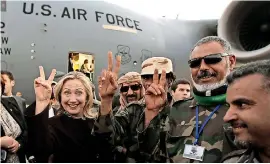  ??  ?? Hillary Clinton as Secretary of State visiting Libya in 2011 after the death of Gaddafi. Reuters