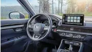 ?? ?? The minimalist dashboard is home to a new nine-inch touchscree­n infotainme­nt system. The Exclusive model gets a fully digitised instrument cluster.