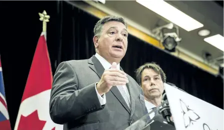  ?? THE CANADIAN PRESS FILES ?? Finance Minister Charles Sousa unveiled the government plan to offer relief to small businesses to help ease the transition of a higher minimum wage in the province’s fall economic statement Tuesday afternoon.