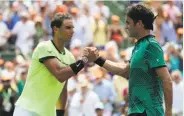  ?? Lynne Sladky / AP ?? Roger Federer (right) shakes hands with Rafael Nadal after winning the Miami Open final in April.