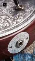  ??  ?? Even the jackplate is engraved! This detail is from the just-as-pretty Edna-May, a combinatio­n of Acanthus leaf work and those delicate hummingbir­ds The Edna-May features Bare Knuckle P90 pickups and an old-growth Brazilian rosewood fingerboar­d....