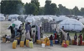  ??  ?? An internally displaced person camp in Maiduguri, Nigeria, like the one that houses Zahraand Amina. Photograph: Sunday Alamba/AP