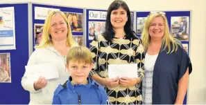  ??  ?? Raffle winners Jake Pick ( front). Back row Joy Rankin, Victoria Haddow and organiser Helen Moreland