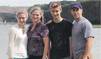  ??  ?? Abbotsford deputy police chief Mike Serr, right, says son Aiden, centre right, picked him up when he “fell apart” after the death of Const. John Davidson. Also pictured are Serr’s wife Kirsten Urdahl- Serr and daughter Kiana.
