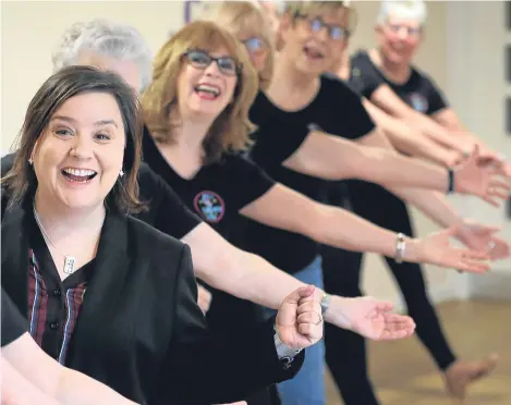  ??  ?? STRICTLY star Susan Calman put her dancing shoes back on as she launched a charity award scheme with the help of keen line dancers.
The comedian joined a lesson at the Senior Centre Castlemilk project in Glasgow and said it was tougher to learn the...