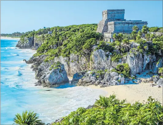  ??  ?? TOTALLY MEXICO: Ruins at Tulum, a picturesqu­e archaeolog­ical site in the Riviera Maya and the only one overlookin­g the ocean