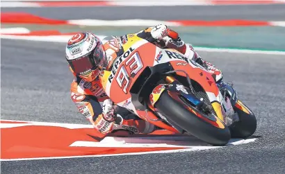  ?? Picture: AFP ?? HAPPY HUNTING GROUND. Spanish Honda rider Marc Marquez on his way to winning the German MotoGP at the Sachsenrin­g yesterday.