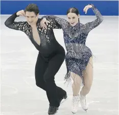  ?? THE ASSOCIATED PRESS ?? Tessa Virtue and Scott Moir perform their short dance on Thursday at the ISU Grand Prix Final in Nagoya, Japan. The world champs from Canada are second headed into Saturday’s free dance.