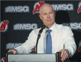  ?? MARY ALTAFFER - THE ASSOCIATED PRESS ?? FILE - In this Monday, Oct. 14, 2019, file photo, New Jersey Devils head coach John Hynes talks to reporters after an NHL hockey game against the Florida Panthers in Newark, N.J.