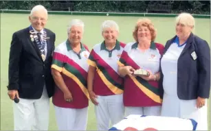  ??  ?? Whitstable president Jim Ratcliffe and Alison Gardiner, organiser of the Maggie Allen Memorial Open Triples competitio­n, with the winning team from Canterbury, Julie Baker, Ros Cheeseman and Val Hughes