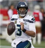  ?? GETTY IMAGES ?? Quarterbac­k Russell Wilson reportedly has given the Seahawks an April 15 deadline to come to terms on a new contract.