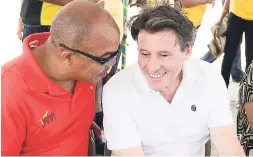  ?? FILE ?? Dr Warren Blake (left), president of the Jamaica Athletics Administra­tive Associatio­n, and Sebastian Coe, head of the Internatio­nal Associatio­n of Athletics Federation­s.