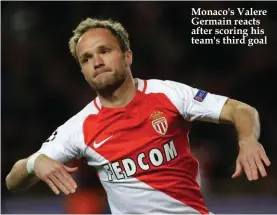  ??  ?? Monaco's Valere Germain reacts after scoring his team's third goal