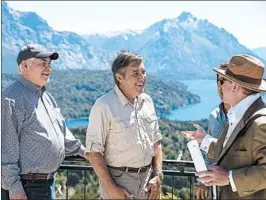  ?? FEDERICO GROSSO/AP ?? U.S. Secretary of State Rex Tillerson, left, and Eugenio Breard, center, director of Argentina’s national parks, visit the Nahuel Huapi Lake in Bariloche, Argentina, on Saturday.