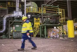  ??  ?? Waste Management is investing in machinery to better reduce contaminat­ion. FCC Environmen­tal Services will take over Houston’s recycling contract in 2019.