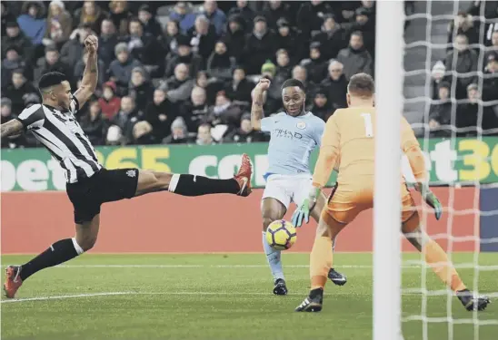 ??  ?? 2 Raheem Sterling scores what proved to be Manchester City’s winning goal against Newcastle at St James’ Park last night.