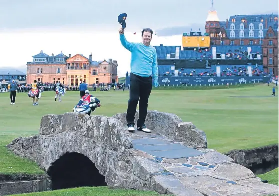  ?? Picture: PA. ?? It was a lot darker than this looks, honest. Tom Watson waves goodbye from the Swilcan Bridge in 2015.