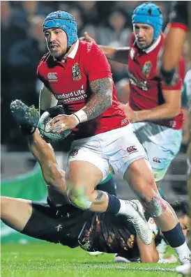  ?? /David Rogers/Getty Images ?? Superb finish: Jack Nowell breaks clear to score his second try for the Lions in their win over the Chiefs on Tuesday.