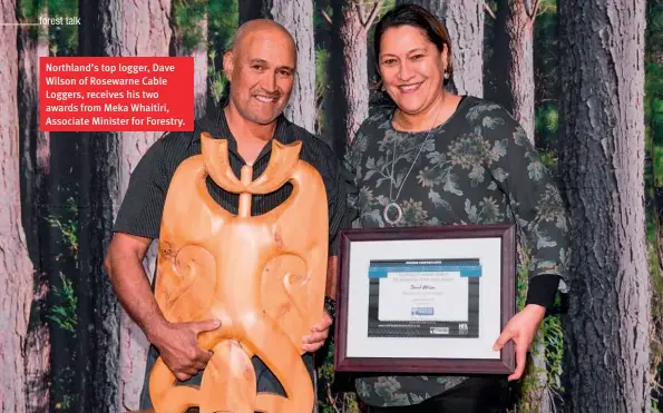  ??  ?? Northland’s top logger, Dave Wilson of Rosewarne Cable Loggers, receives his two awards from Meka Whaitiri, Associate Minister for Forestry.