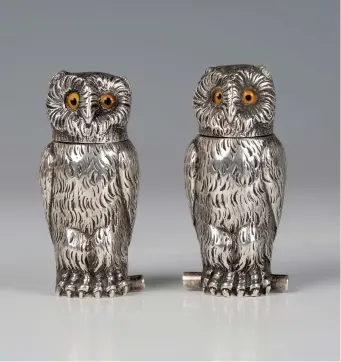  ?? ?? A pair of Victorian novelty silver owl salt and pepper, London 1879, by Thomas Johnson II, height 6.5cm © Toovey’s 2021.