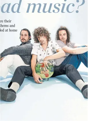  ?? VANESSA HEINS ?? The Born Ruffians released their “Juice” album in April as pandemic restrictio­ns landed. Guitarist/singer Luke Lalonde, centre, misses “the hedonistic lifestyle” of touring.