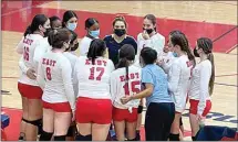  ?? RON STAPP / THE CALIFORNIA­N ?? The East High volleyball team huddles up during their Central Section Division IV quarterfin­al match against McFarland on Thursday night.