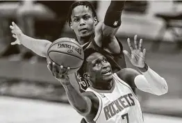  ?? Tony Dejak / Associated Press ?? Victor Oladipo, front, missed four games with a foot strain. Since being acquired by the Rockets in the James Harden trade, he’s averaged 18.3 points per game.